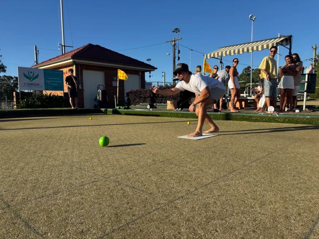 Man playing Lawn Bowls in Camden with Barefoot Bowls Casual Hire booking.
