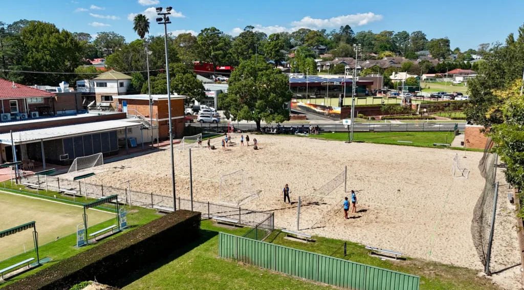 School group using the beach sports sand area in Camden.
